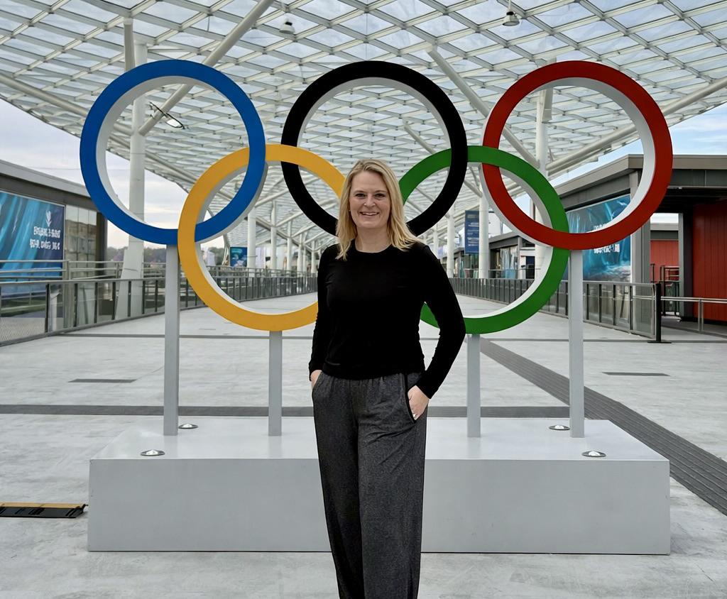 When the U.S. women’s ice hockey team clinched Olympic gold in Milan in dramatic overtime fashion, 1991 SUNY Oswego graduate Katie Kranze Million wasn’t on the ice — but she was sprinting toward it.