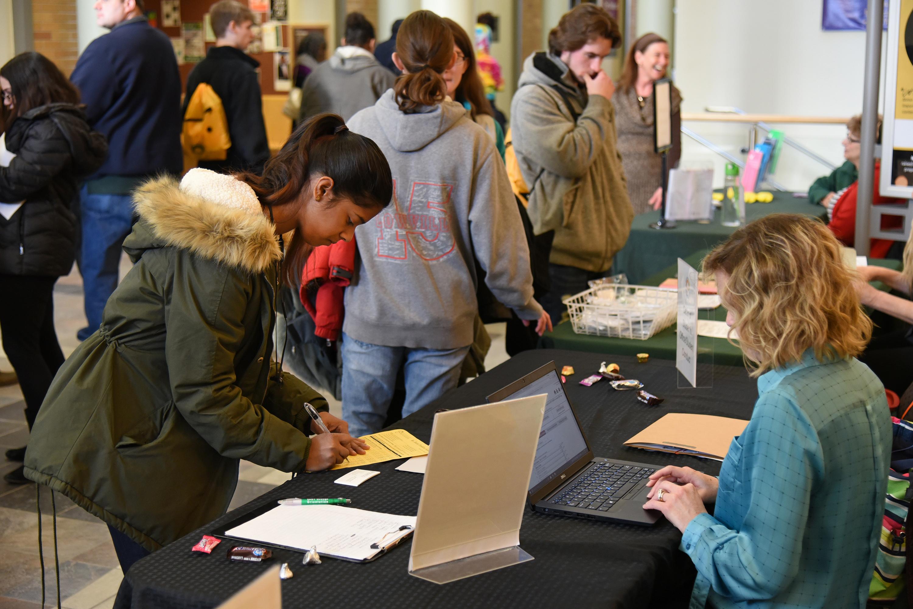 Students finding answers during orientation