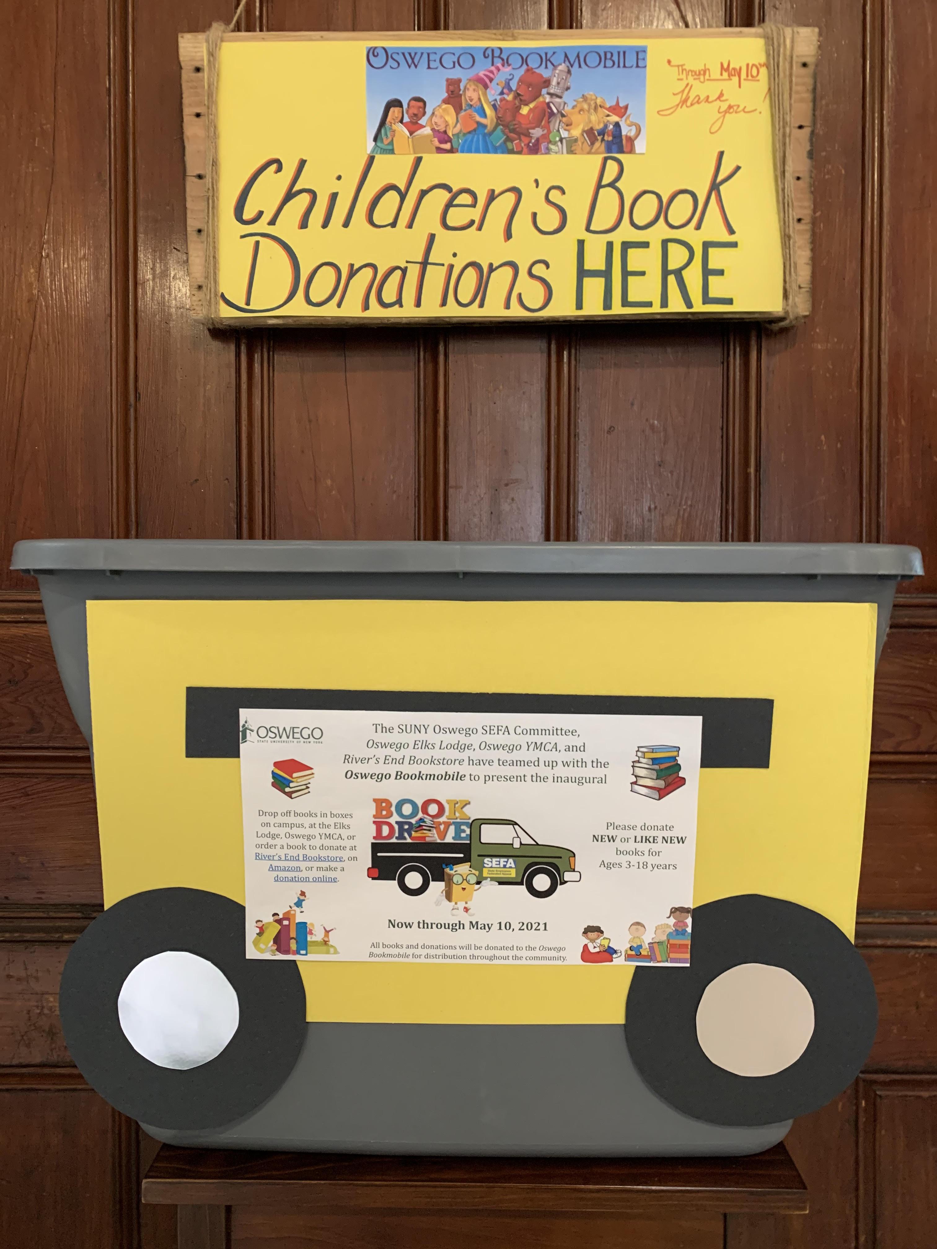 Book drop at Oswego YMCA soliciting donations for the SEFA book drive supporting the Oswego Bookmobile