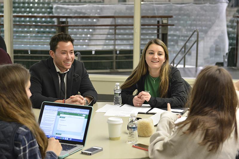 Students at a round table for Oz Leads