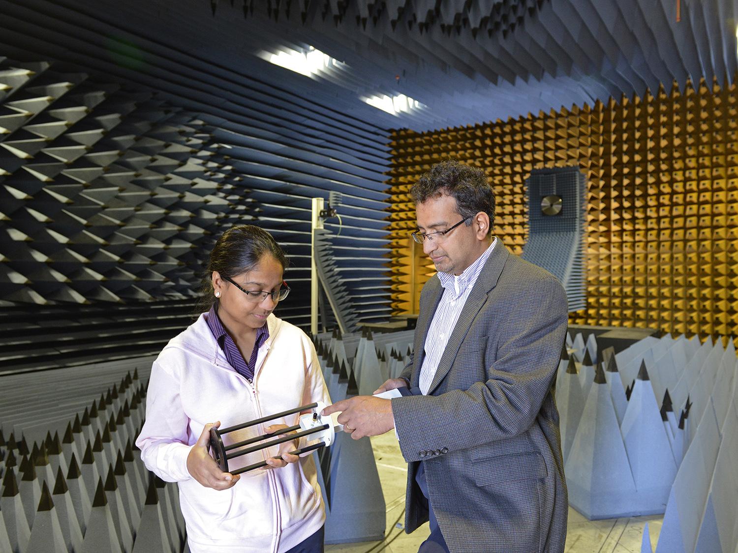 Pat Parimi in anechoic chamber working with Neha Keshan