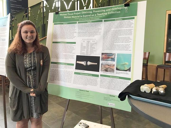 Hannah Kruse presenting a conference poster