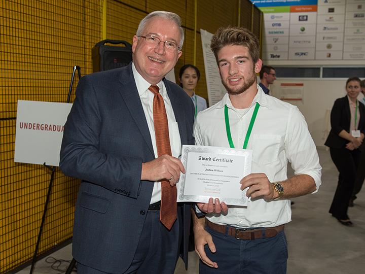 Josh Willson receives award for his poster presentation at Syracuse Center of Excellence