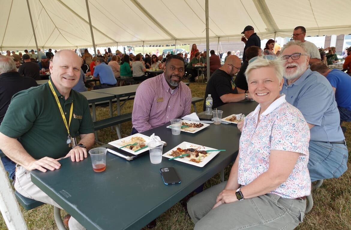Administrators from SUNY Oswego enjoy the Campus Appreciation Barbeque