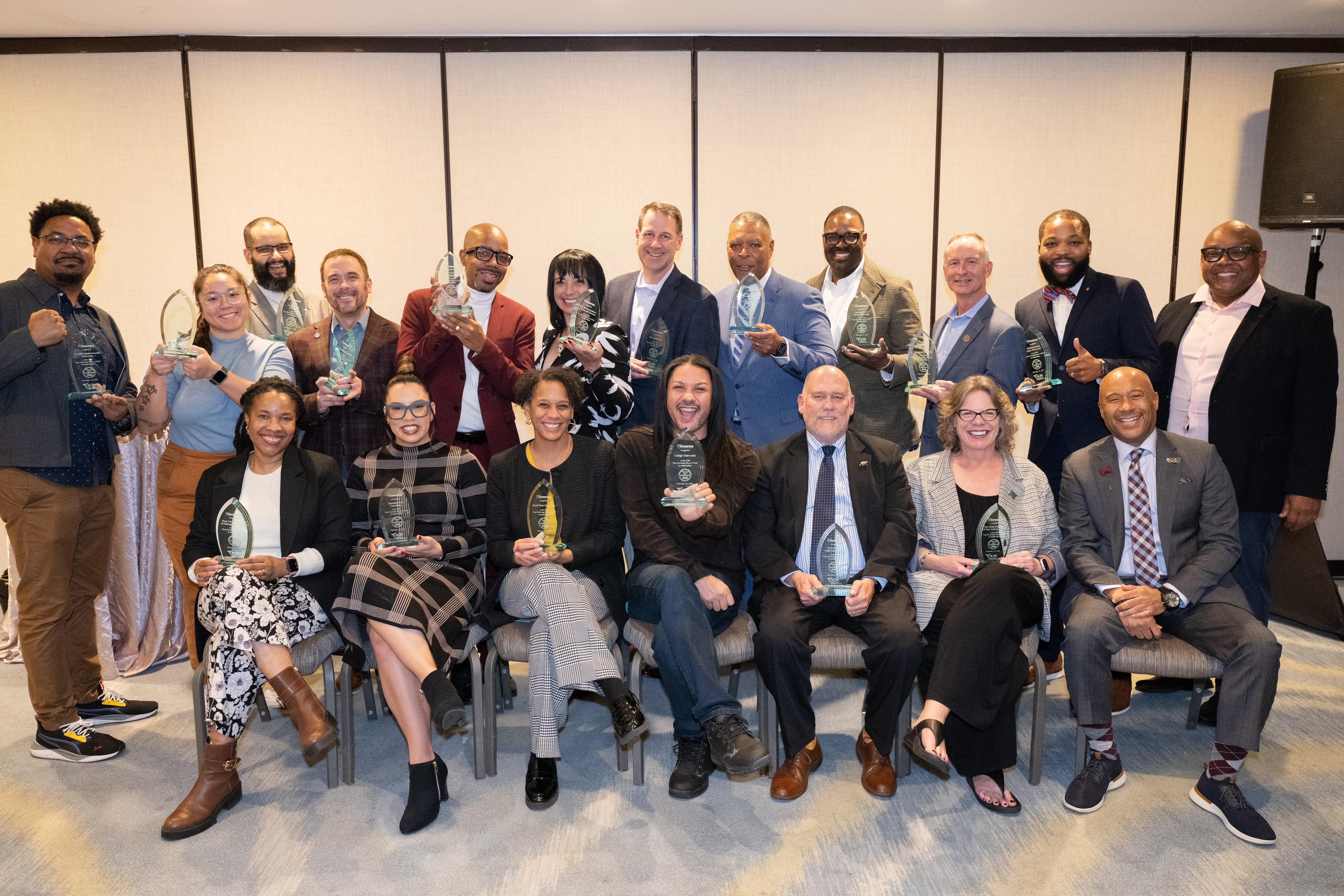 Administrators from “The Most Promising Places to Work in Student Affairs” gather to receive awards at the ACPA: College Student Educators International Conference