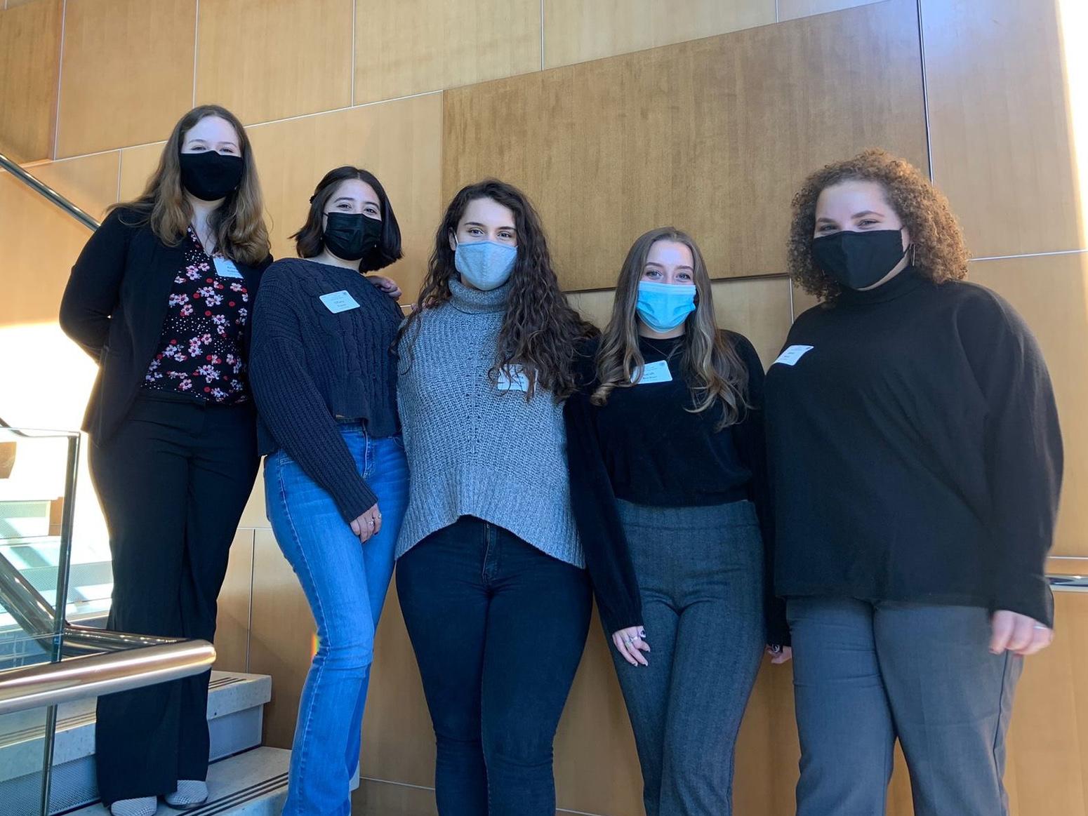 From left, biological sciences students Kelsey Roberts, Tiffany Flores, Palina Saljanin, Sarah Buckler and Alexia Perez present at the Rochester Academy of Science 47th annual Paper Session.