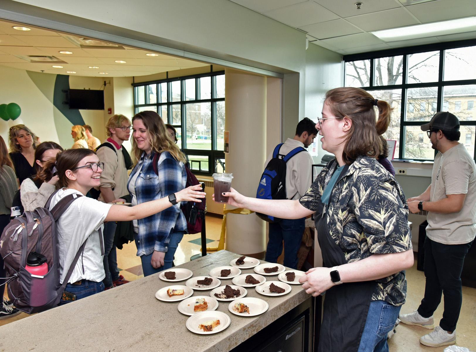 Customers line up at Rich and Pour Café in Rich Hall