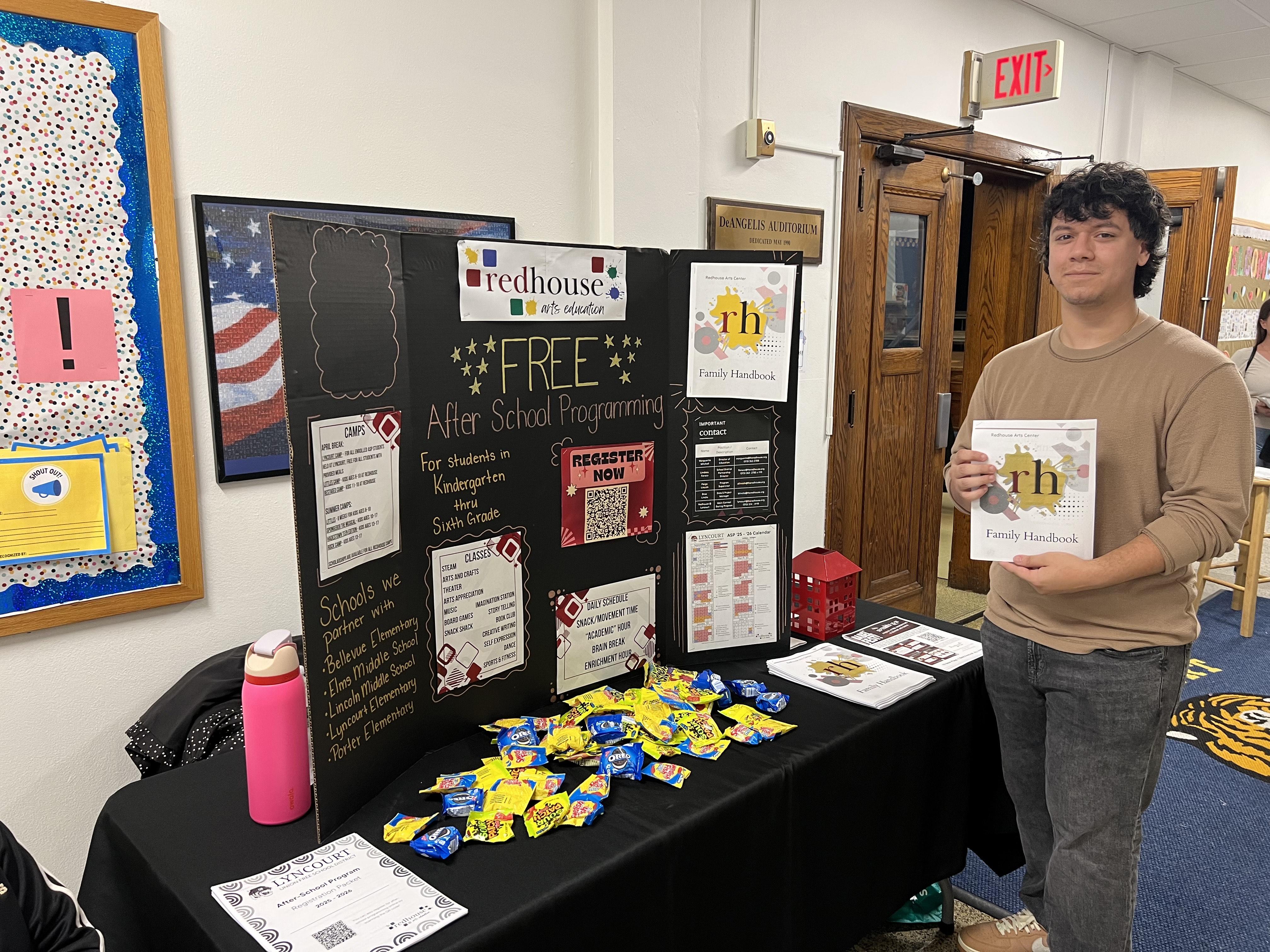 James Rizza works a recent open house at Lyncourt Elementary School for the Redhouse Arts Center