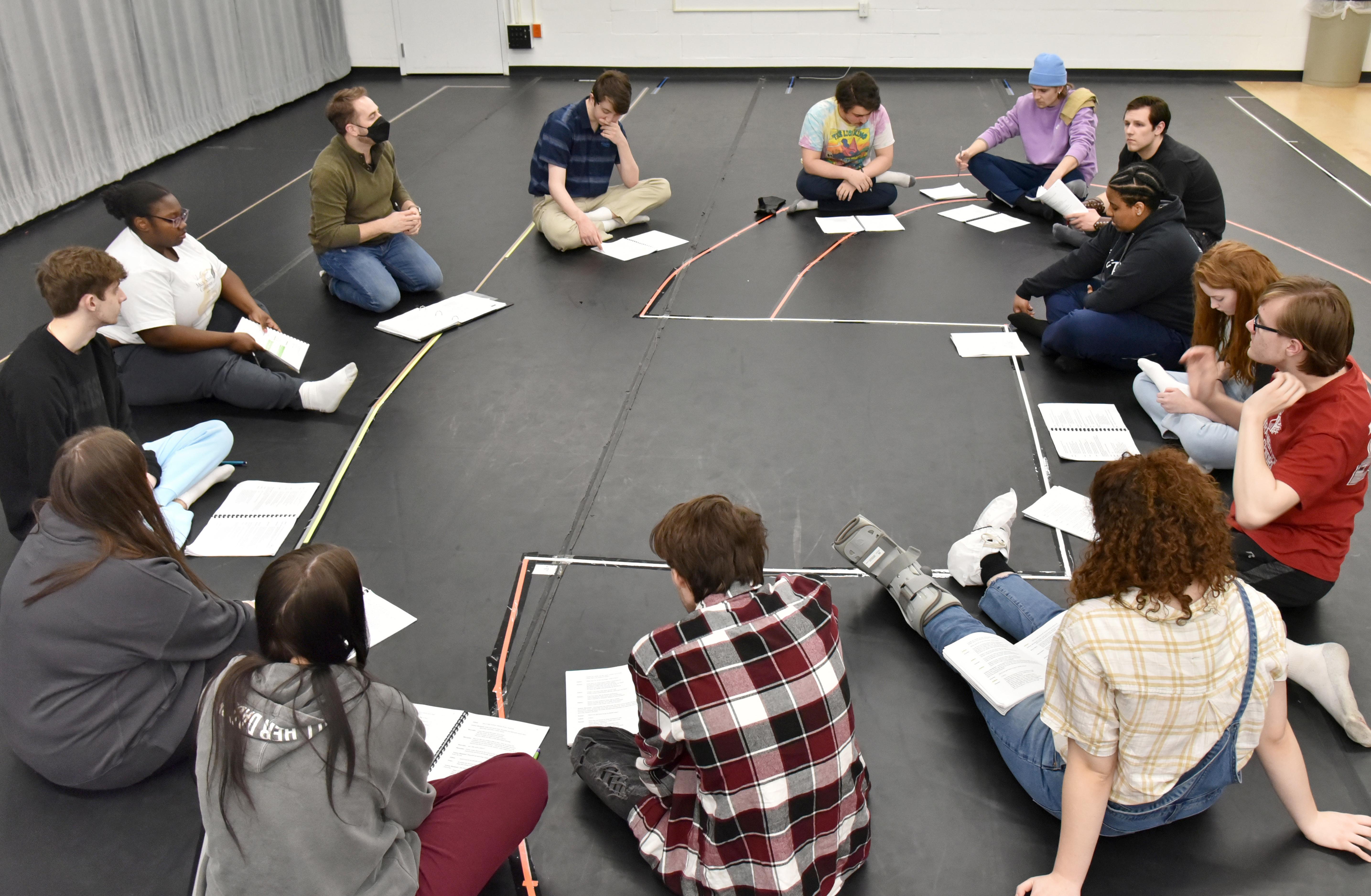The cast of Romeo and Juliet take part in a reading early in the production cycle