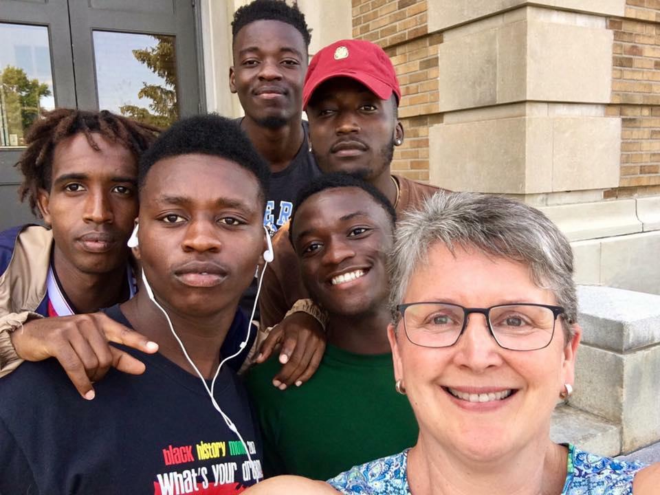 Sandra Bargainnier with Oswego students she has mentored