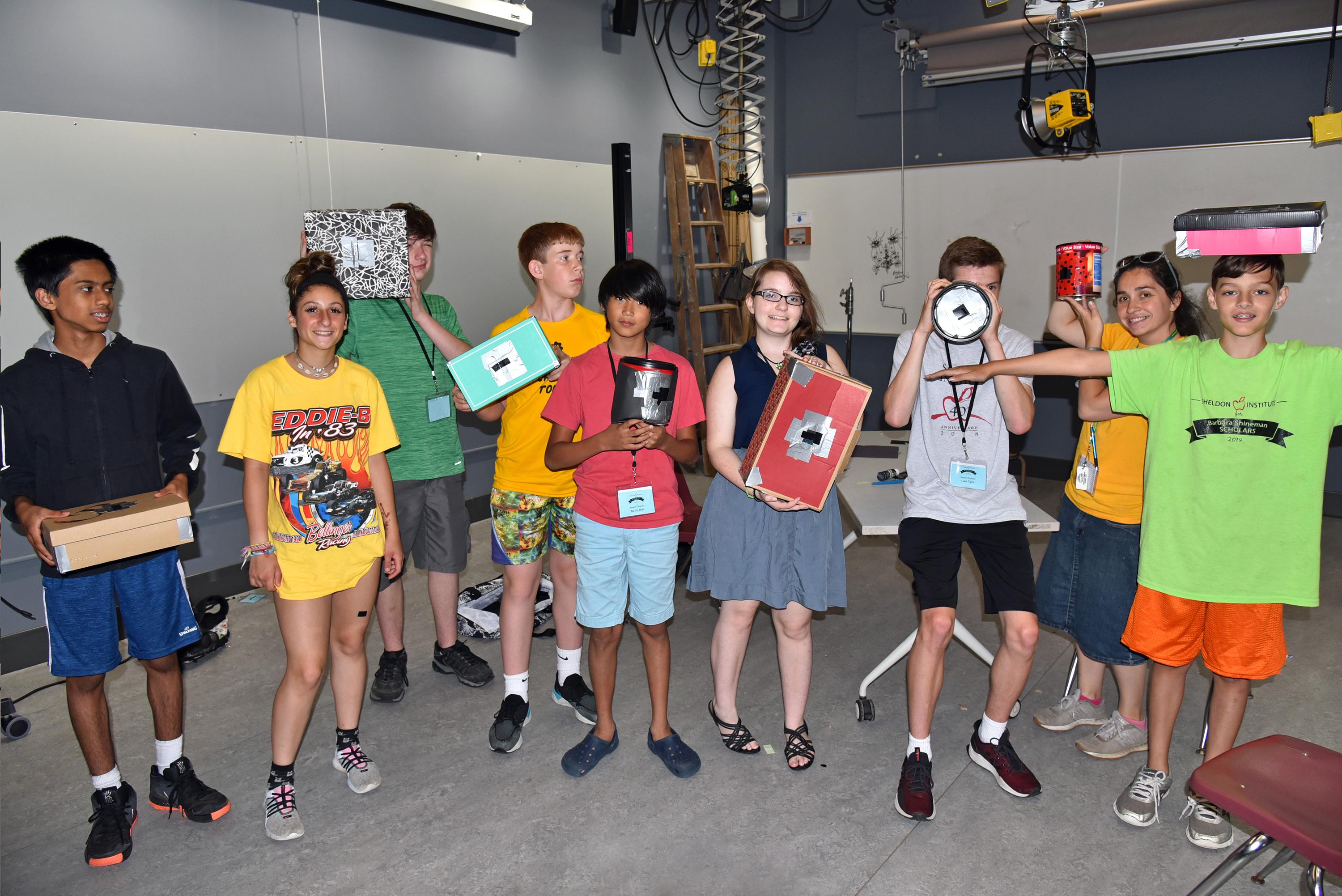 Young participants show off projects they constructed at a previous edition of the summer enrichment camp Sheldon Institute