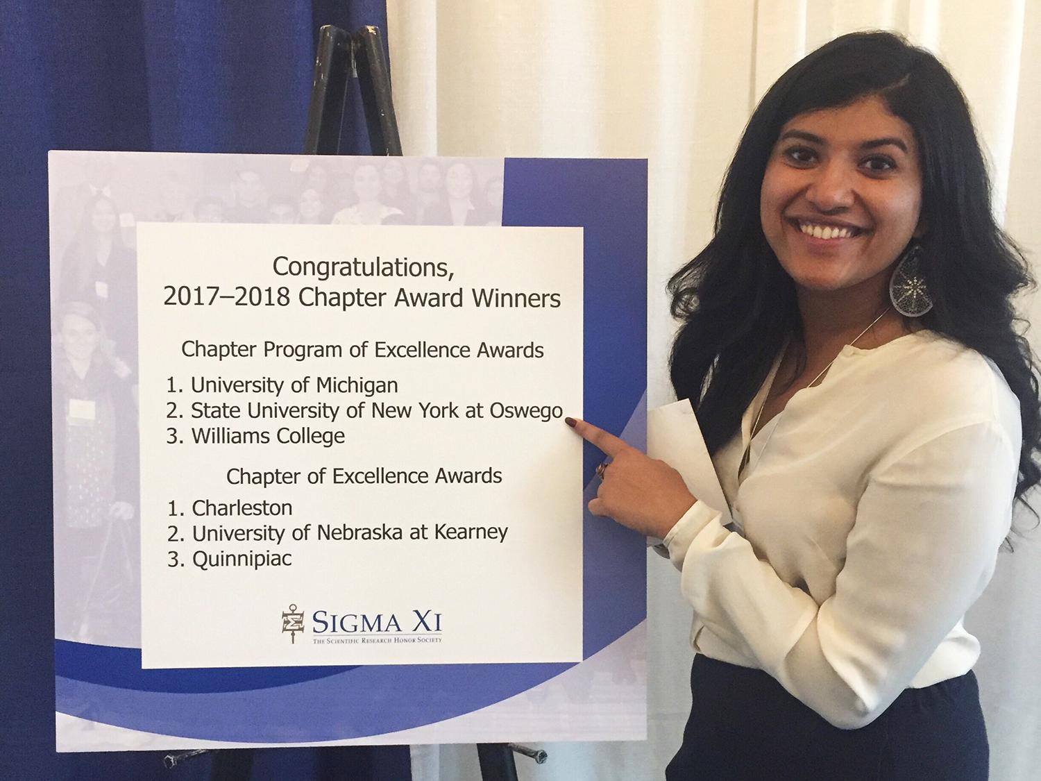 Manna Job shows pride in college's research accomplishments at Sigma Xi international conference