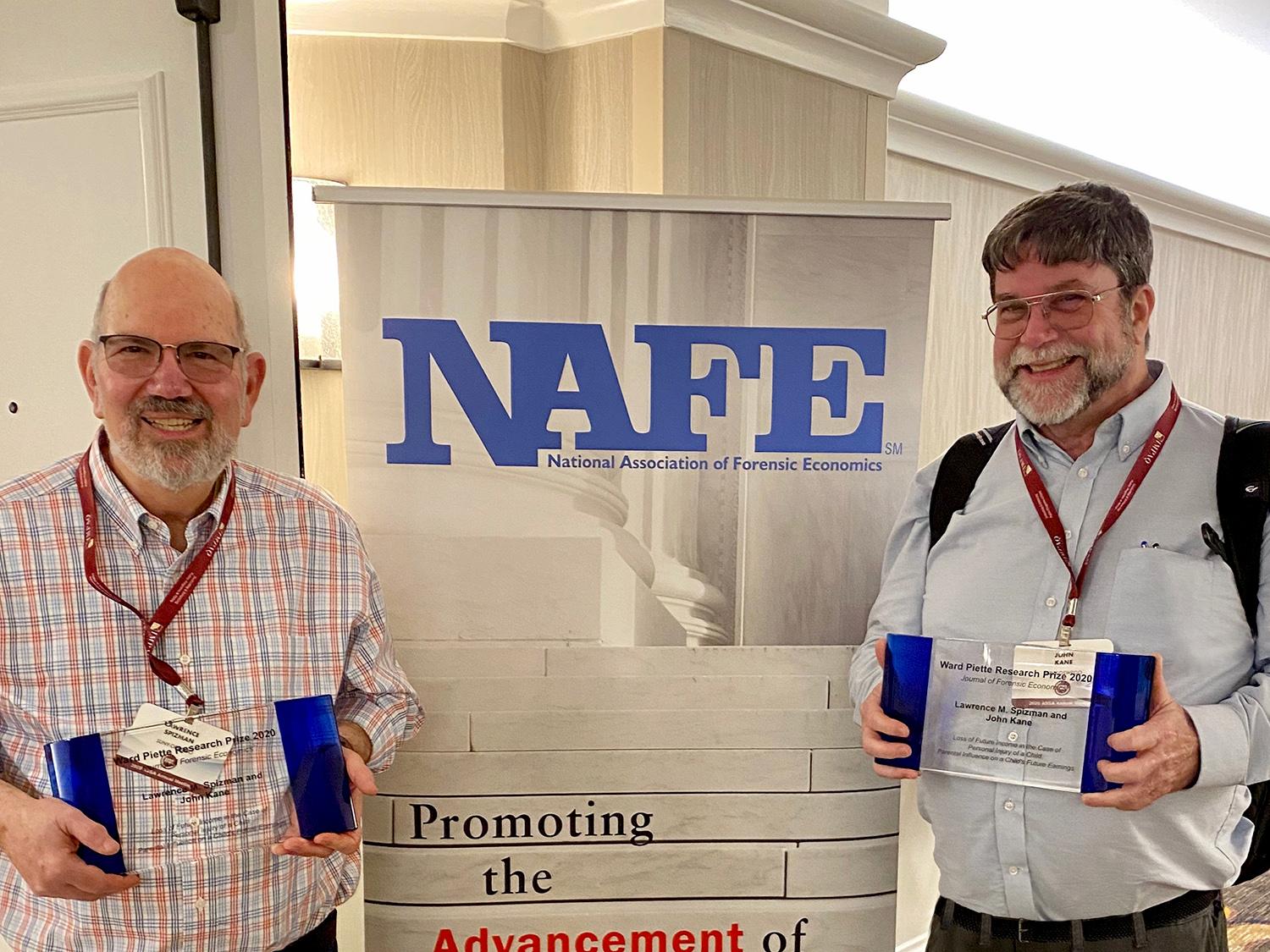 Larry Spizman and John Kane with economics award