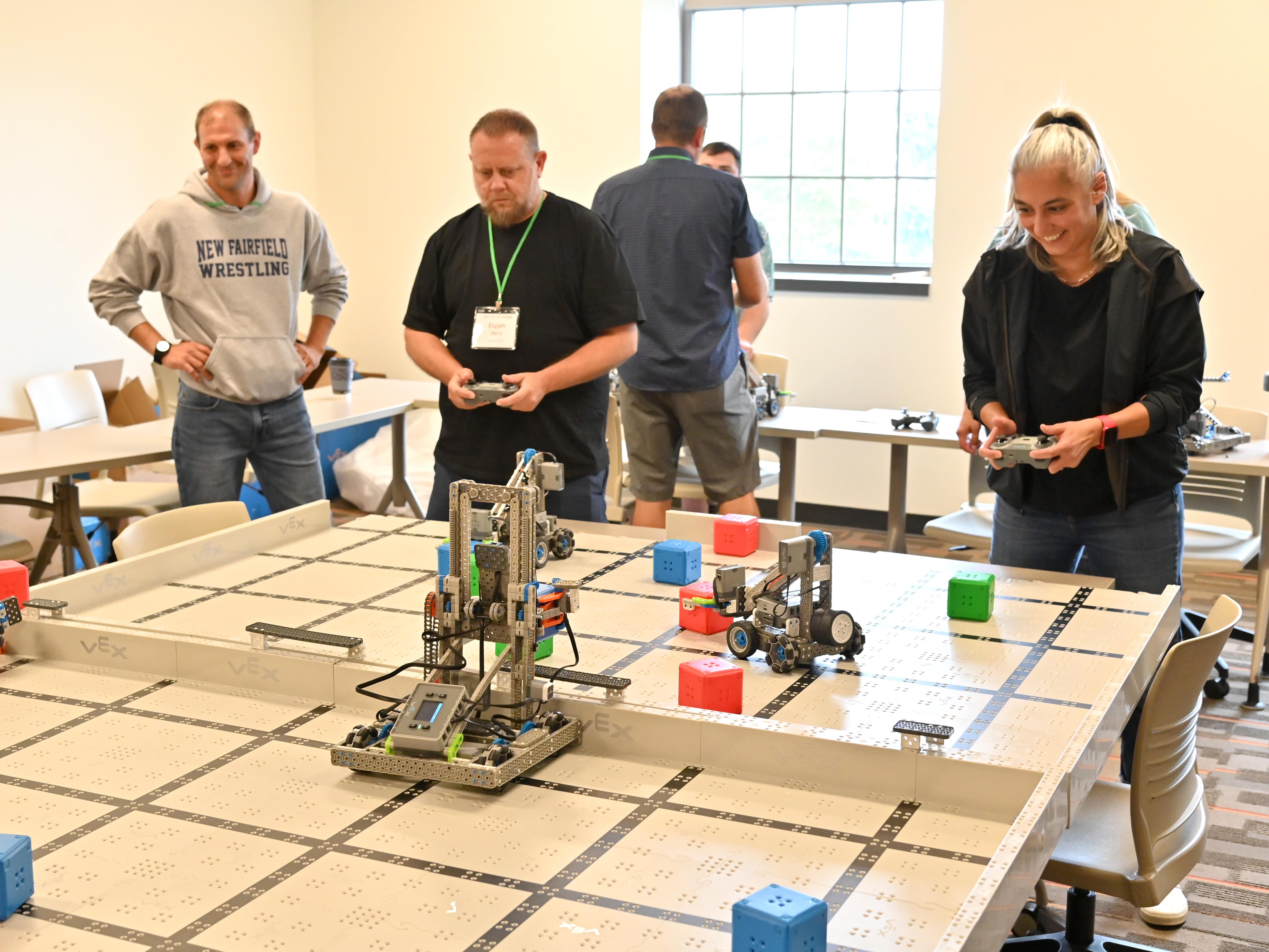 Teachers from around New York state converged on the SUNY Oswego campus in August fort VEX IQ robotics training, sponsored by a grant from Micron Technology