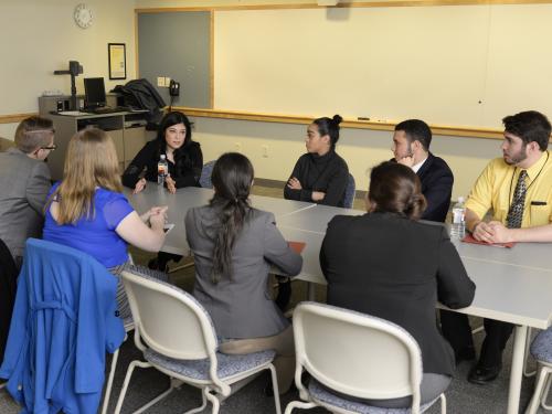 Ferial Govashiri speaking to students