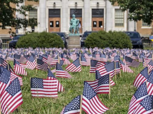 Students, veterans, first responders, faculty, staff, administrators and community members planted 2,996 flags on the front lawn of Sheldon Hall to remember every person killed in the 9/11 terrorist attacks
