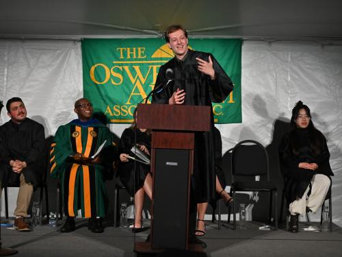 Graduating senior Jonah Hawthorne described the meaningful nature of his Oswego journey in a Torchlight speech that drew cheers, laughs and tears from those in attendance on May 15.