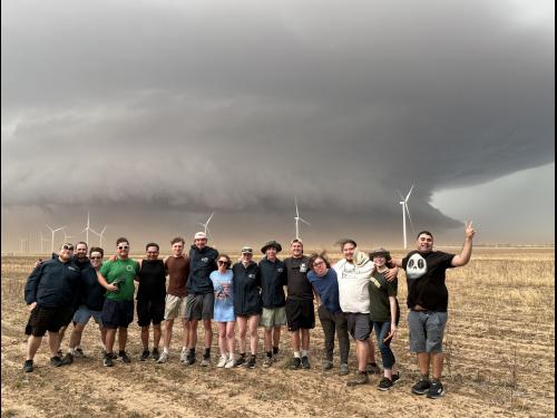 SUNY Oswego storm-chasing students pause (from a safe distance) with a supercell near Tahoka, Texas