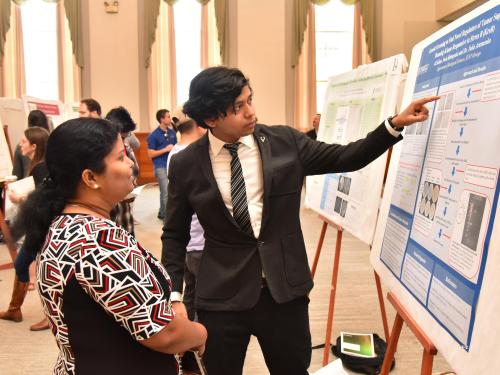 Ali Khan makes a poster presentation