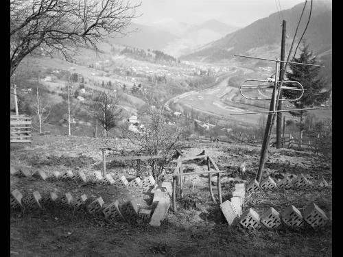 Black and white photo of an antenna upon a hill in Ukraine