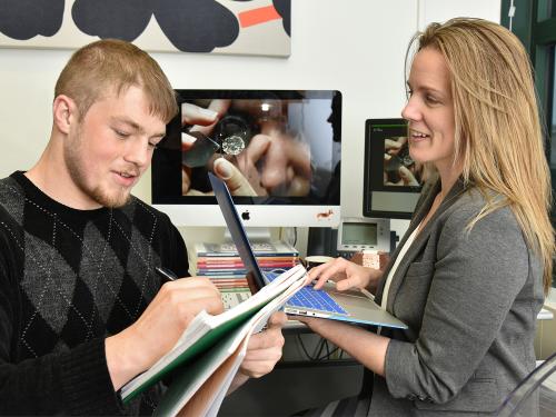 Dr. Lindsay Bell and student Howard Boutelle discuss research on diamond supply chain