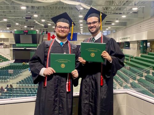 The Campos brothers celebrate together at SUNY Oswego's May 2025 Commencement