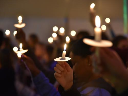 Torchlight is an annual ceremony at the beginning and end of the semester celebrating the torch of knowledge, symbolized by participants holding candles