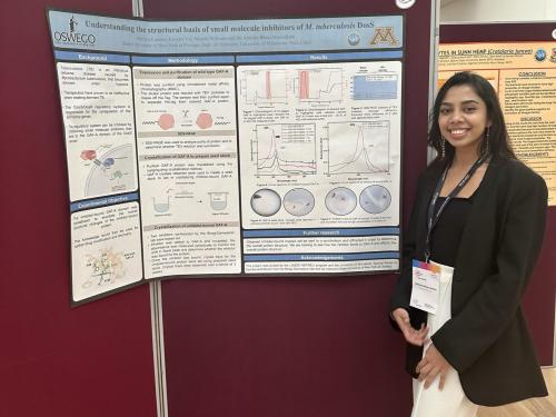 SUNY Oswego senior biochemistry major Fathima Raviya Careem shows off her research presentation at this year’s World Congress of Undergraduate Research in the U.K.