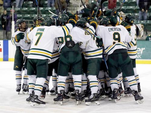 Laker men's hockey players celebrate