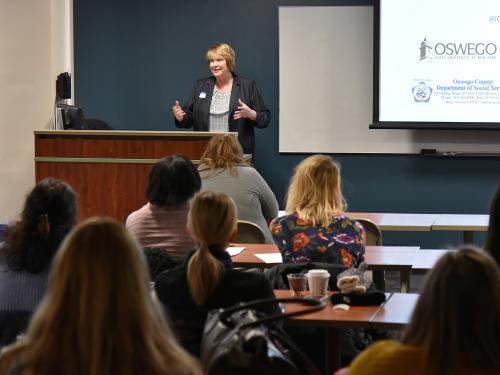 Stacy Alvord, county commissioner of social services, speaks to Circle of Security kickoff event