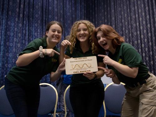 Oswego technology education students Bryleigh Beauchat, Eliza Sarigiannis and Taylor Mackowiak celebrate their win in the Technology and Engineering Education Collegiate Association Communication Challenge