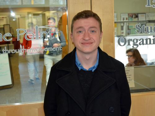 Conner Breese stands outside The Point, the student involvement hub