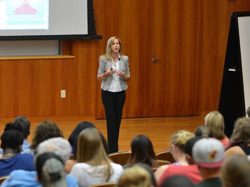 Michele Gay, who founded the non-profit Safe and Sound: Securing Our Schools, shown speaking on campus