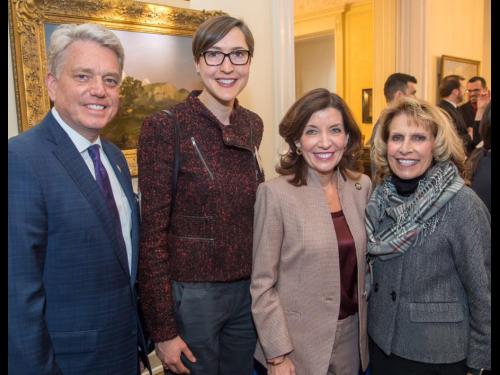(Left to right) Brian Stratton, director of the New York State Canal Corporation; Kristi Eck, SUNY Oswego chief of staff; Lieutenant Governor Kathy Hochul; and SUNY Oswego President Deborah F. Stanley gather at a reception held in the Governor's Executive