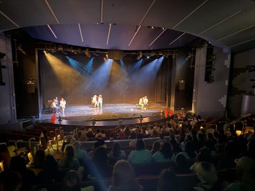 Hundreds of high school students take in a performance in Waterman Theatre during Dramafest