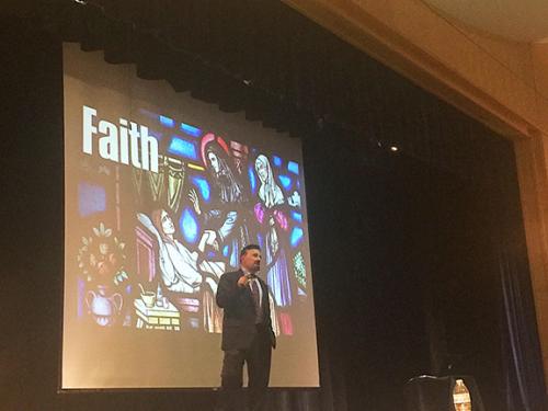 Frank DeAngelis, Columbine's former principal, speaks at national briefing; a slide behind him reads: faith