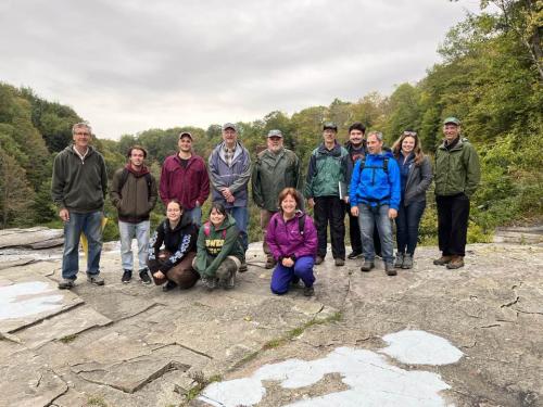 Geologist gather for a group photo during an outing at a recent statewide conference hosted by SUNY Oswego geologists