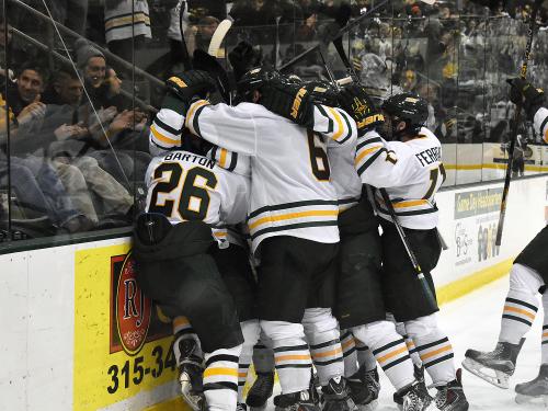 Hockey players celebrating