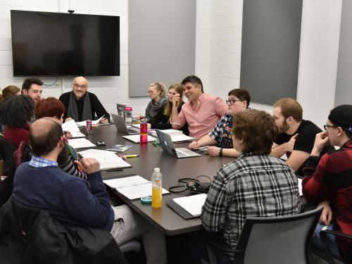 Cast and crew doing a pre-production group reading