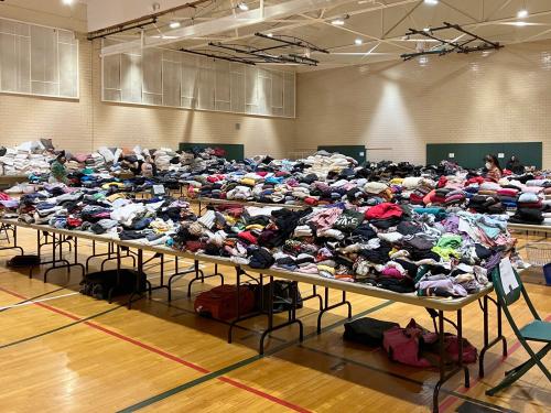 Tables upon tables of clothes fill Swetman Gym during the 2022 OzThrift Sale