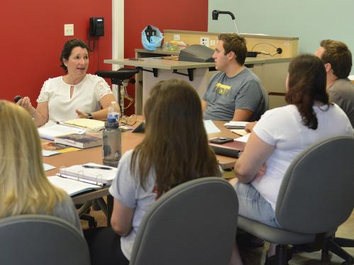 Maria Murray speaks to literacy education class