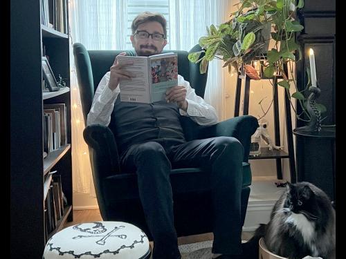 Murat Yasar with a copy of his popular book, “The North Caucasus Borderland Between Muscovy and the Ottoman Empire, 1555-1605"