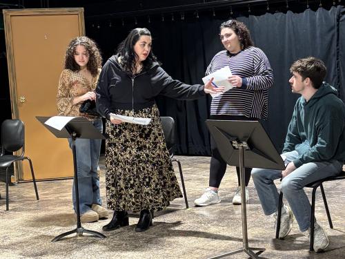 Bella Poynton, assistant professor of theatre, gives direction at a rehearsal for ""An Existential Staged Reading of Jean-Paul Sartre’s 'No Exit.'"