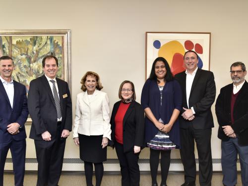 Administrators from Novelis and SUNY Oswego gather to celebrate the company's donation of $150,000 to SUNY Oswego to endow two scholarships for SUNY Oswego students with financial need.