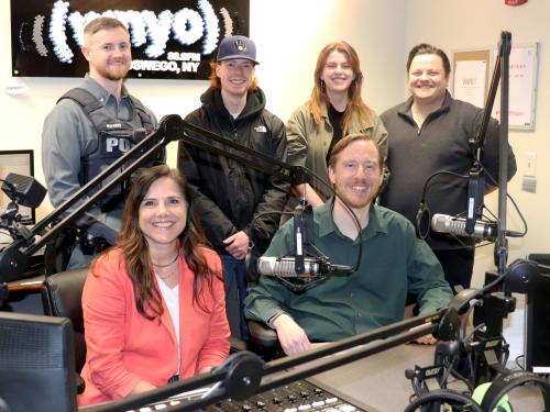 Representatives of WNYO radio, Oswego County Opportunities and University Police gather to prepare for the second 24-hour Radiothon