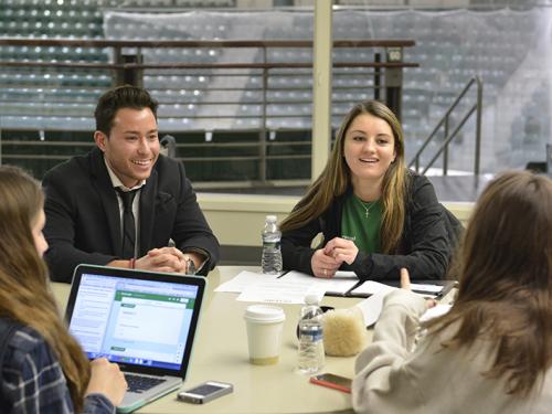 Students at a round table for Oz Leads