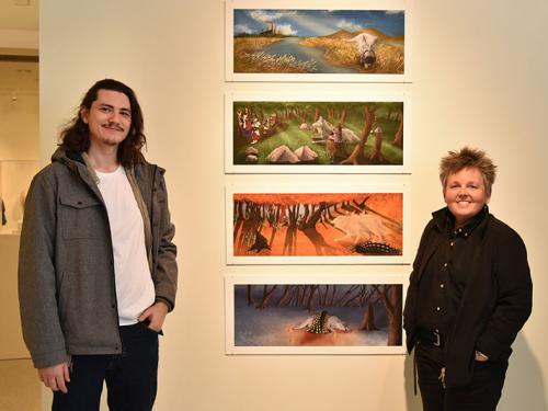 Student artist Arden McBride with faculty member Amy Bartell