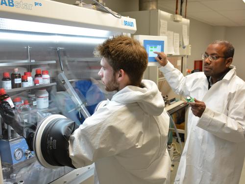 Student Josh Willson and faculty member Dr. Mohammad Islam work in a lab