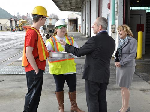 President Stanley with port director and students