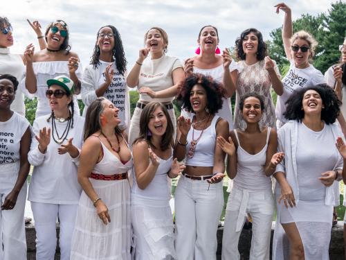 The Resistance Revival Chorus (RRC) is a collective of more than 60 women and non-binary singers who join together to breathe joy and song into the resistance, and to uplift and center women’s voices.